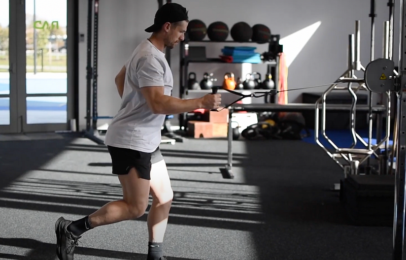 Child performing a single-leg row