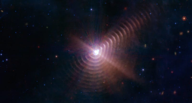 Concentric dust rings around the WR140 binary star system.