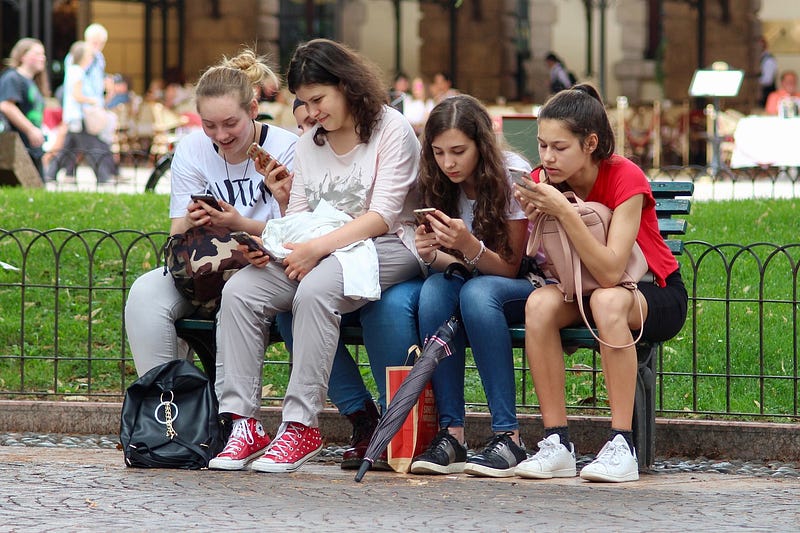 Teenagers taking a break from smartphones