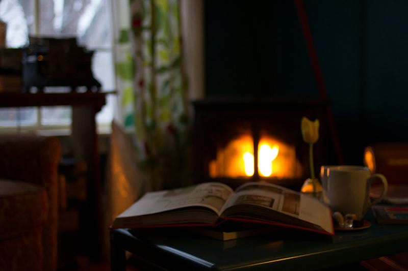 A serene reading nook by the fireplace